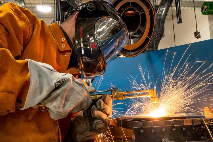 Welding student at work.