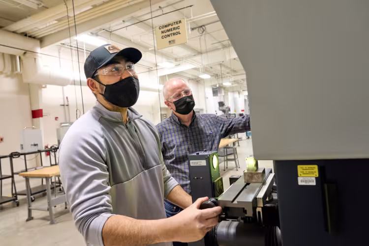 Students working in a machine operations class.