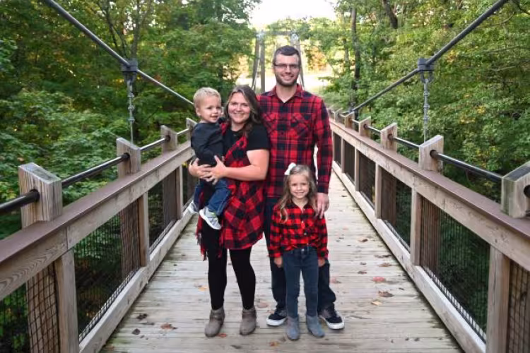Morgan Brink never dreamed she’d excel in college. Now at 32, she’s on the Dean’s List at GRCC and working toward graduating with honors. Brink is shown here with her husband, Brandon, and their children, Beau, left and Thea.