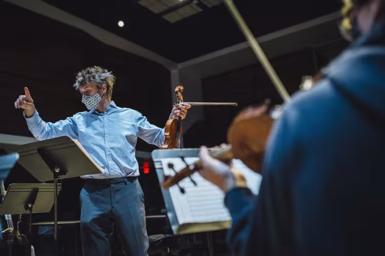 Professor Libor Ondras working with students.