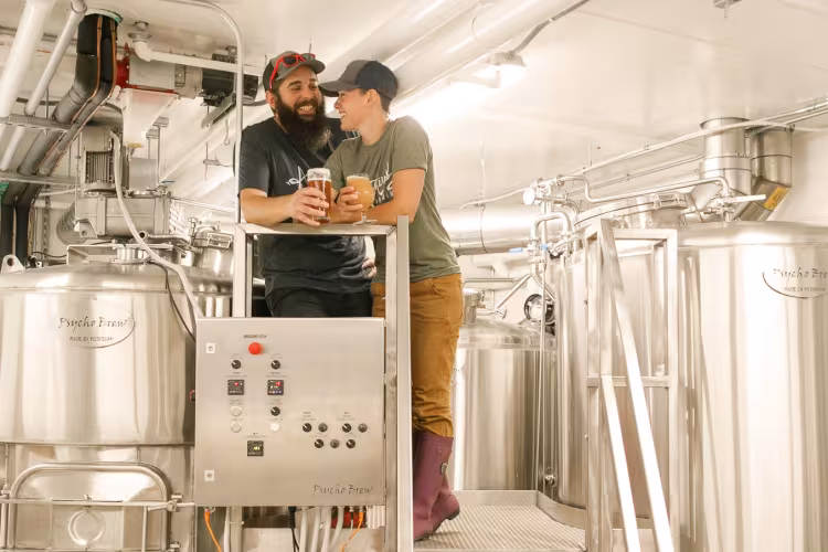 Levi and Callee Knoll in their brewery.