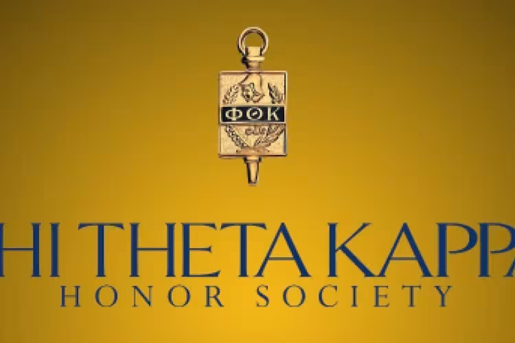The PTK emblem on a golden background