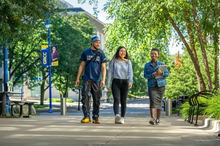 Promise zone students walking on the main campus