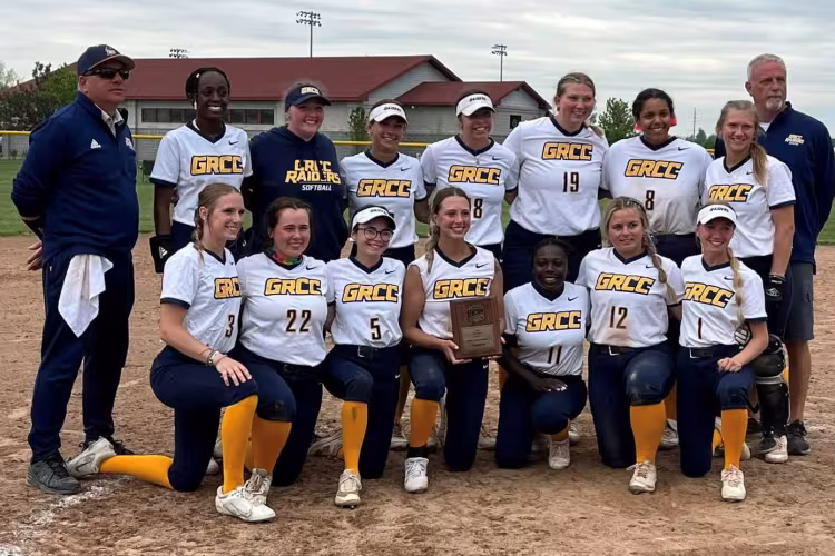 GRCC softball team posing after its Saturday game.