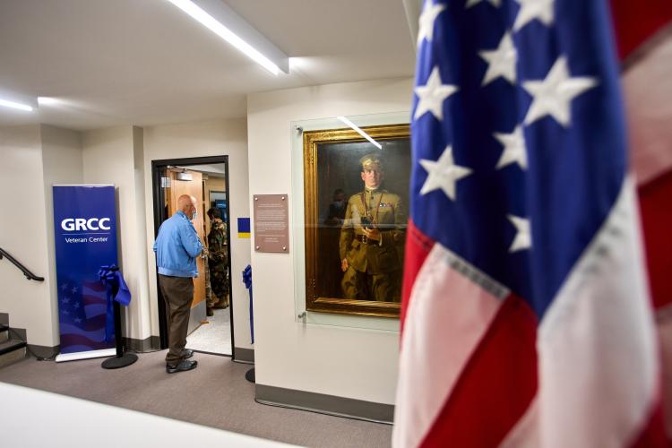 Student walking into the GRCC Veterans Center.