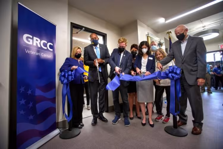 Cutting the ribbon at the new GRCC Veterans Center.