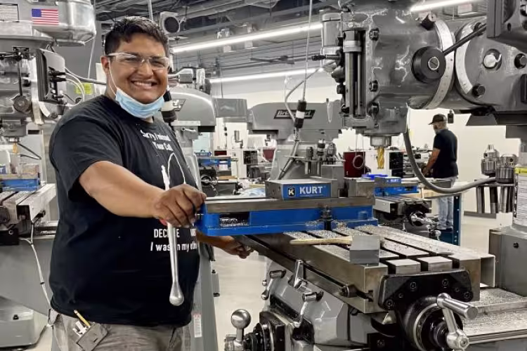 Jose Villanueva working in the machining lab.