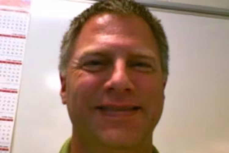 Headshot of Greg Cprfixsen.