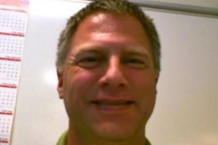 Headshot of Greg Cprfixsen.