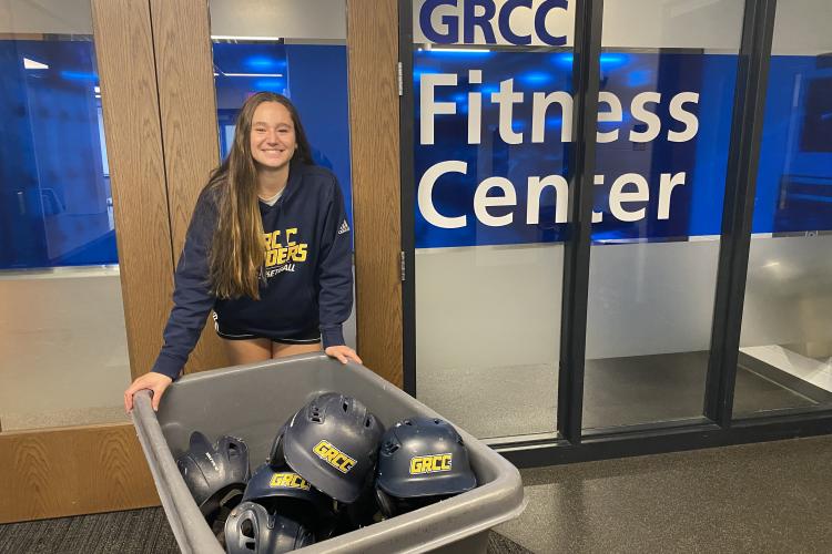 Karissa Ferry working in the fieldhouse.