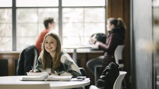 Student studying in RJF Hall