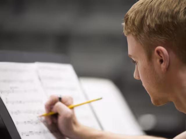 GRCC student writing music.