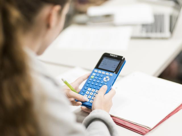 Student with calculator 