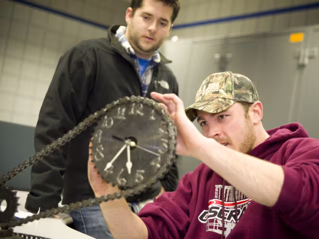 Student working on making a working clock