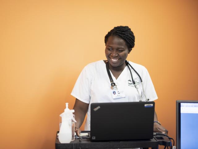 Nursing student working on a computer