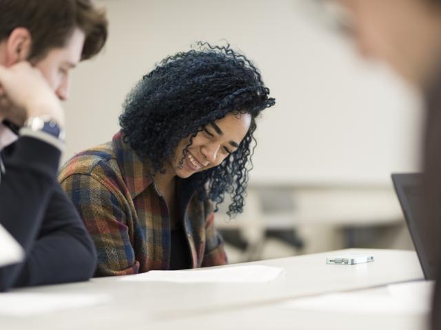 Two students working in a classroom