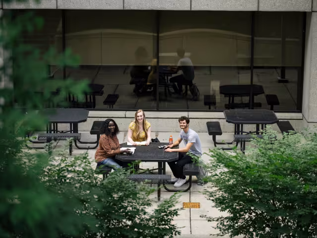 Students studying outside of the Student Center.