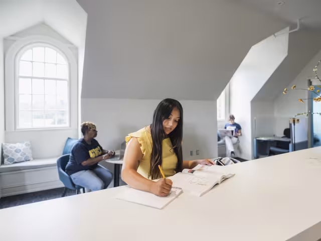 Student working on homework in Ender hall