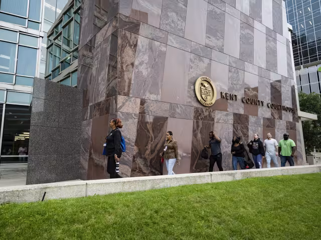 Criminal justice students walking outside the Kent county courthouse