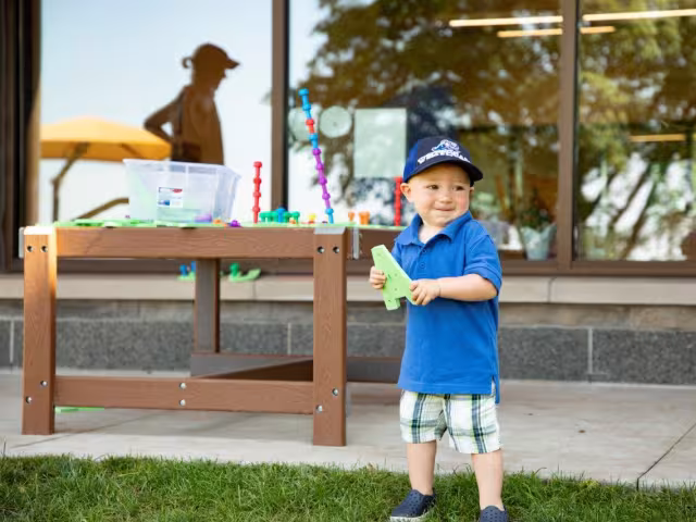 Preschooler playing with toys
