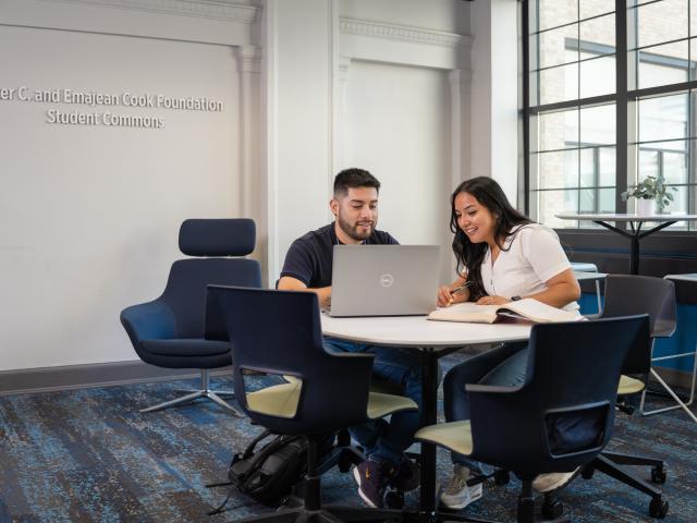 Students working on a laptop