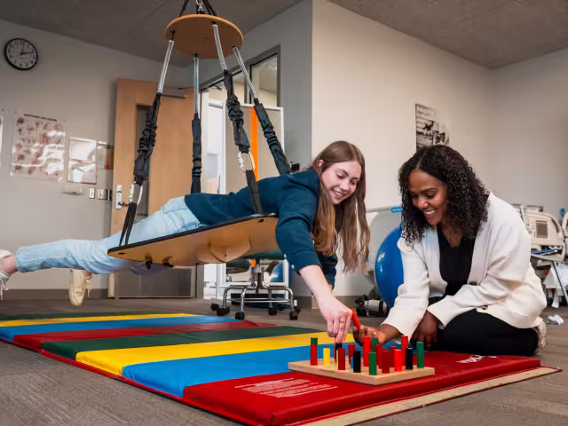 Occupational Therapy Assistant students working with therapy blocks