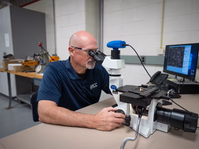 Quality Science student working on a project
