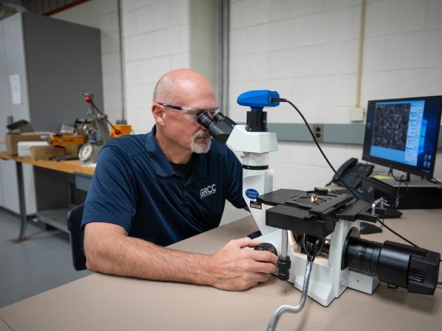 Quality Science student working on a project