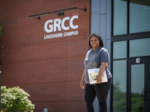 Student outside the Lakeshore building