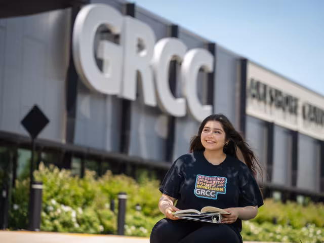 Student studying outside at the Lakeshore Campus