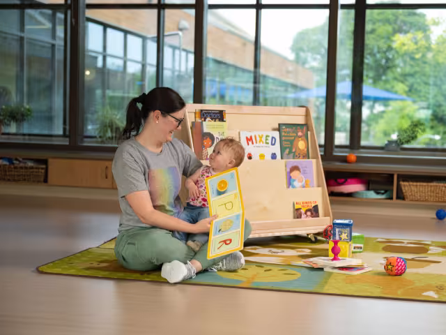 Infant playing in the learning center
